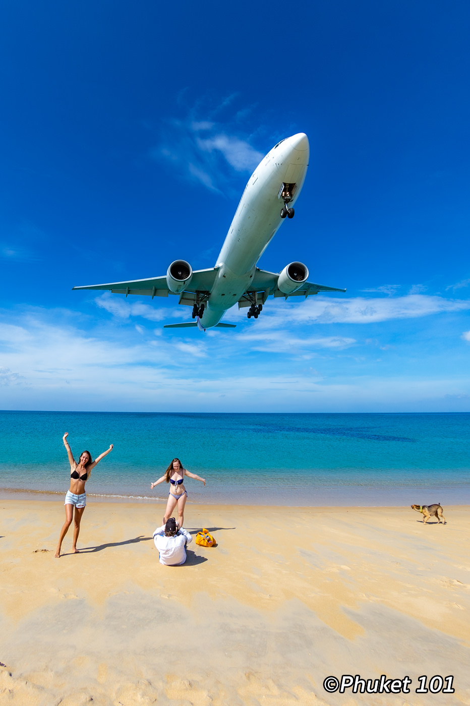 Plane landing over the beach at Phuket Airport